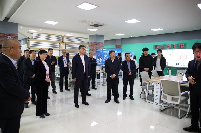 Delegation from the Zhangqiu District University-Local Government Cooperation Joint Conference Visits QIT for Research and Inspection